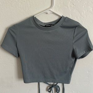 Crop slim shirt, light blue.